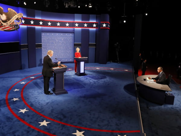Republican presidential nominee Donald Trump speaks on stage with Democratic presidential nominee Hillary Clinton during the presidential debate at Hofstra University in Hempstead, N.Y., Monday, Sept. 26, 2016.